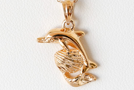 Dolphin on a Shell Pendant